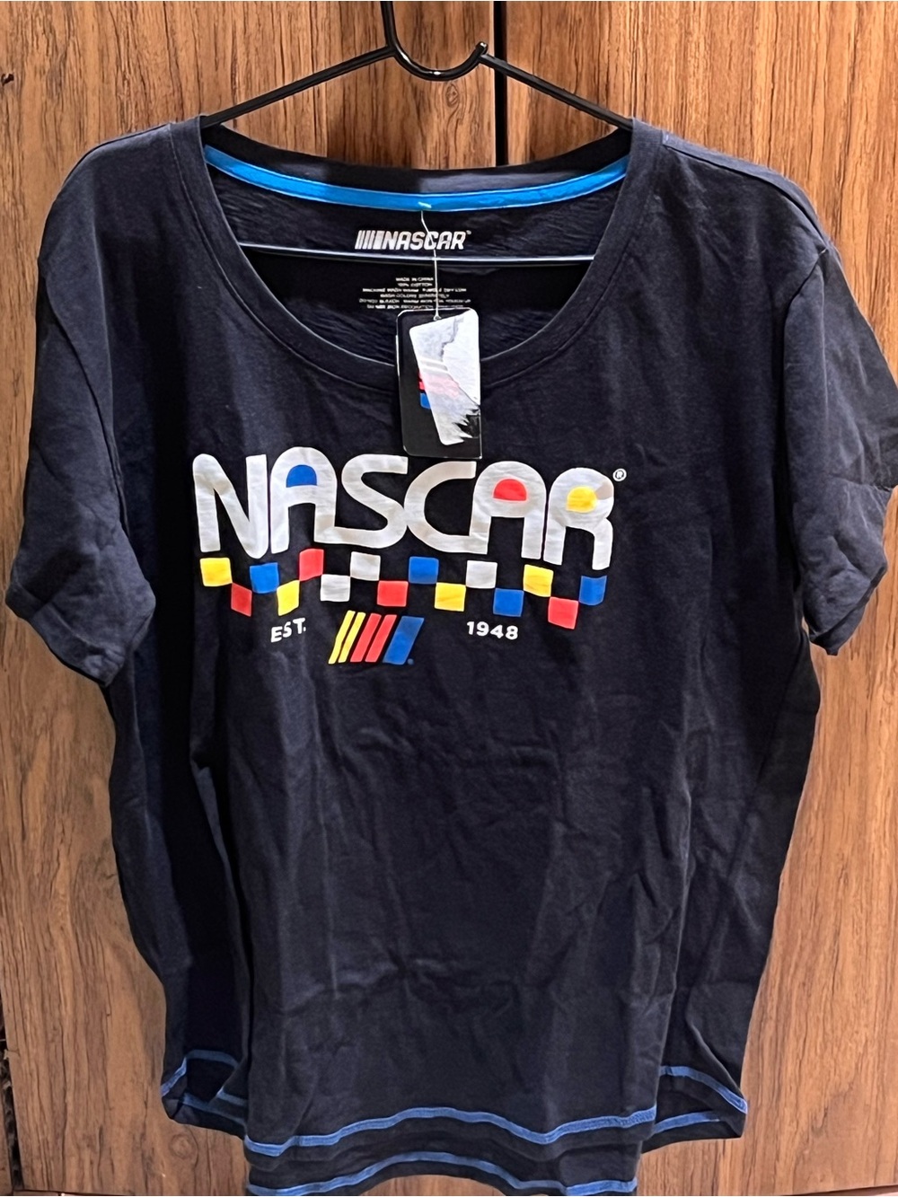 Nascar Black T‑Shirt with Red Yellow and Blue Accent Logo
